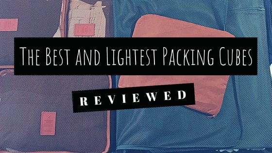 The Best and Lightest Packing Cubes - Reviewed. Photo: open suitcase organized with packing cubes.